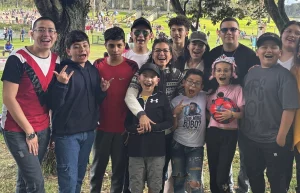 Happy kids with adults in a park